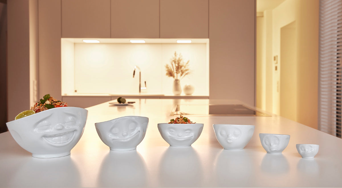 Mixed porcelain bowls by FIFTYEIGHT PRODUCTS, including cereal bowls, salad bowls and small egg cups.