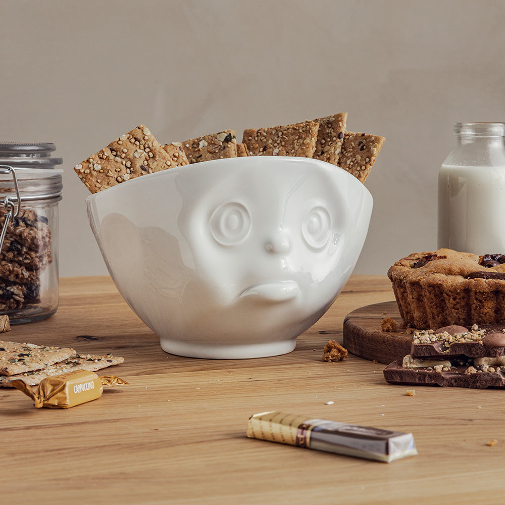 Premium porcelain bowl in white from the porcelain product family of fun dishware by FIFTYEIGHT Products. Offers 16 oz capacity perfect for serving cereal, soup, snacks and much more. Dishwasher and microwave safe bowl featuring a sculpted ‘sulking’ facial expression. Shipped in exclusively designed gift box.