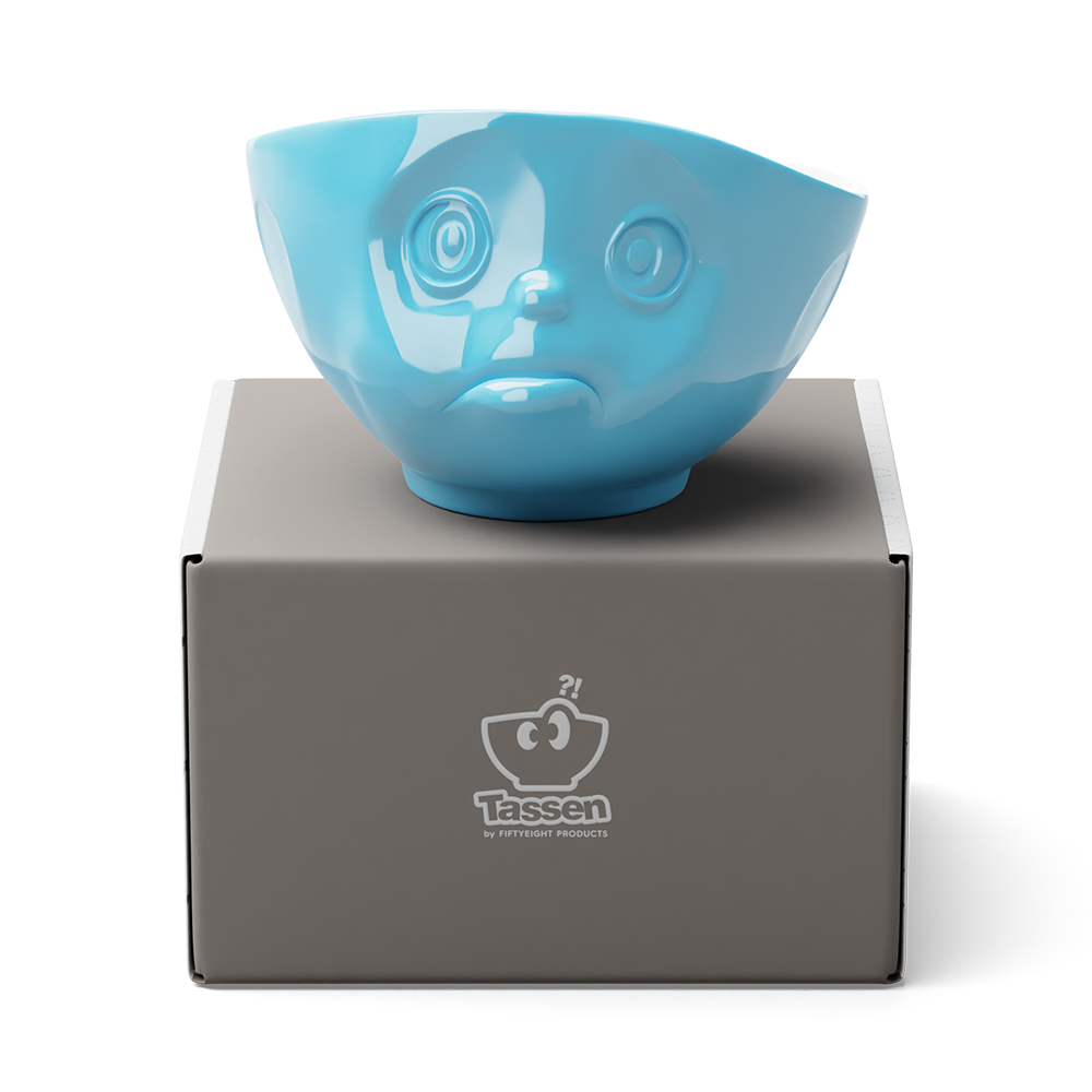 Premium porcelain bowl in blue from the porcelain product family of fun dishware by FIFTYEIGHT Products. Offers 16 oz capacity perfect for serving cereal, soup, snacks and much more. Dishwasher and microwave safe bowl featuring a sculpted ‘sulking’ facial expression. Shipped in exclusively designed gift box.