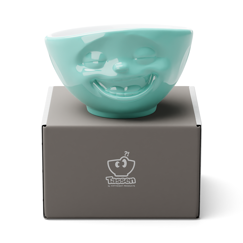 Premium porcelain bowl in mint color from the porcelain product family of fun dishware by FIFTYEIGHT Products. Offers 16 oz capacity perfect for serving cereal, soup, snacks and much more. Dishwasher and microwave safe bowl featuring a sculpted ‘laughing’ facial expression. Shipped in exclusively designed gift box.