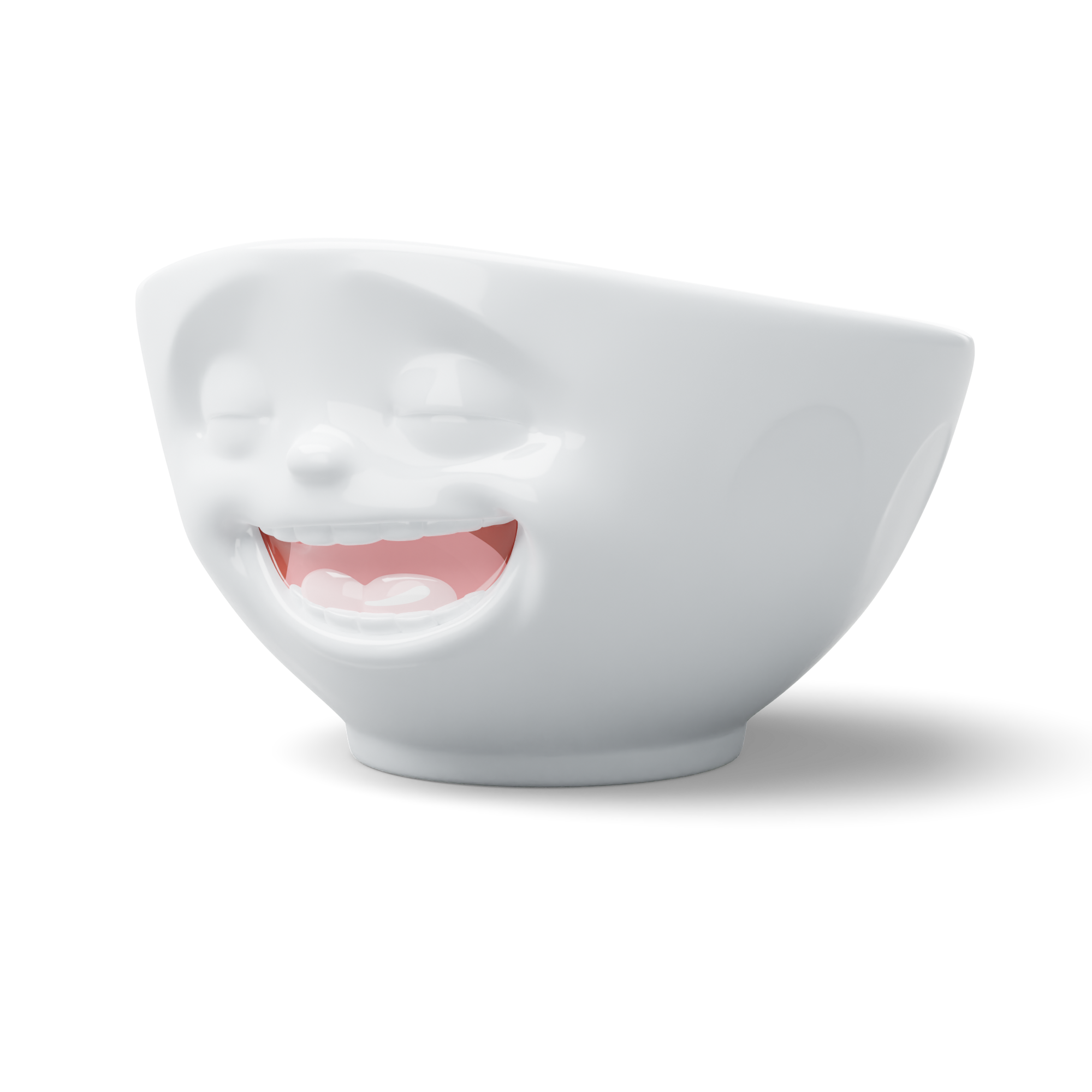 Premium porcelain bowl with colorful accents from TASSEN product family of fun dishware by FIFTYEIGHT Products. Offers 16 oz capacity perfect for serving cereal, soup, snacks and much more. Dishwasher and microwave safe bowl featuring a ‘Laughing’ facial expression and colorful details. Shipped in gift box.