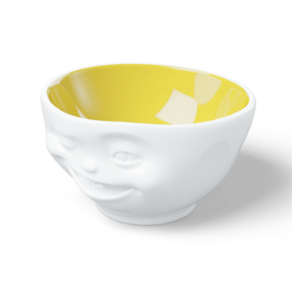 Premium porcelain bowl in white with Saffron Color Inside from the porcelain product family of fun dishware by FIFTYEIGHT Products. Offers 16 oz capacity perfect for serving cereal, soup, snacks and much more. Dishwasher and microwave safe bowl featuring a sculpted ‘winking’ facial expression. Shipped in exclusively designed gift box.