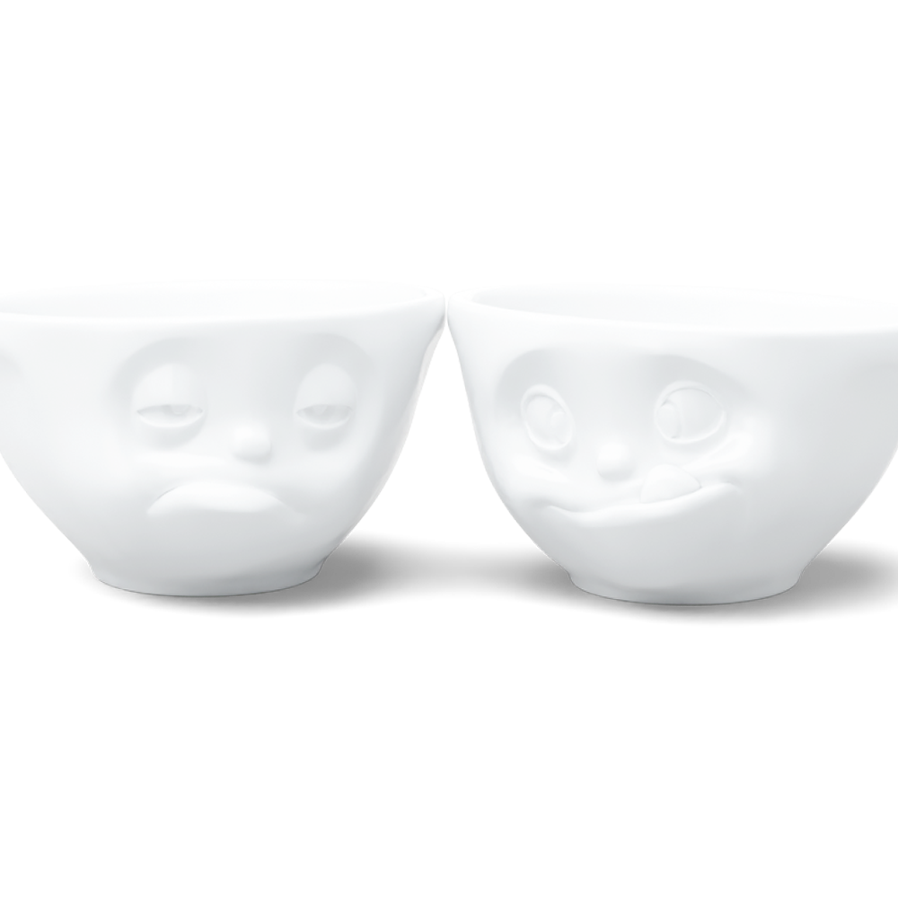 Set of two 6.5 oz. bowls in white from the porcelain product family of fun dishware by FIFTYEIGHT Products. Perfect for serving snacks, nuts, chips, dips, sauces, and a few scoops of ice cream. Dishwasher and microwave safe bowls featuring sculpted ‘tasty’ and 'snoozy' faces. Shipped in exclusively designed gift box.