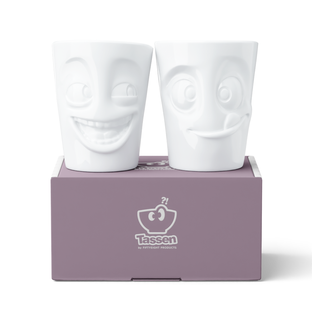 Set of two coffee mugs without handles in white from the porcelain product family of fun dishware by FIFTYEIGHT Products. Each offering 11 oz capacity. Dishwasher and microwave safe coffee cups with a 'joking' and one with a 'tasty' facial expression. Shipped in exclusively designed gift box.