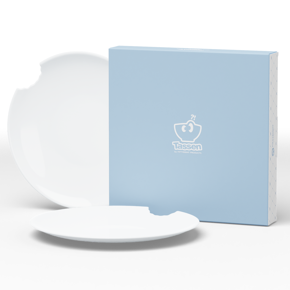 Set of two premium porcelain dinner plates in white with a 'bite mark' cutout at the edge. Dishwasher and microwave safes plate with a 11 inch diameter. From the porcelain product family of fun dishware by FIFTYEIGHT Products. Made in Germany according to environmental standards.