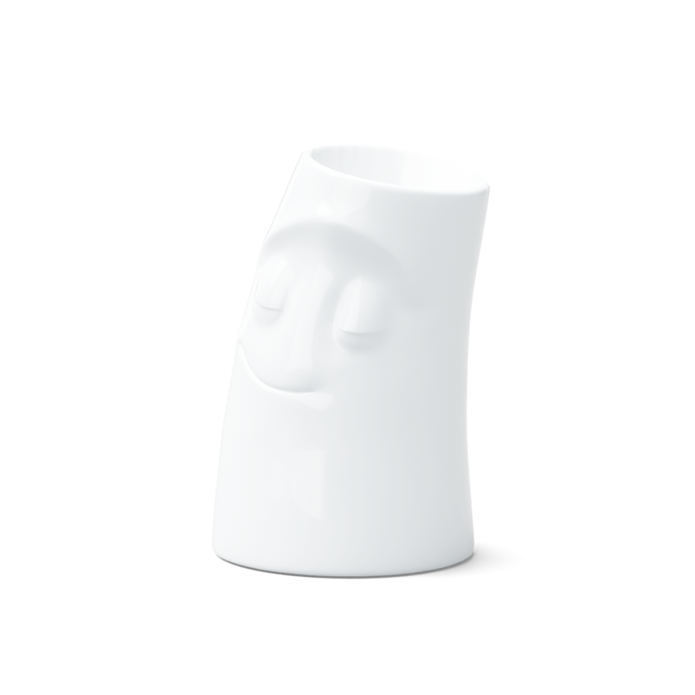 Exclusive designer candle holder with CUDDLY facial expression. Stands at 4.4 inches tall on a footed base and fits a tea light or LED light. From the TASSEN product family of fun dishware by FIFTYEIGHT Products. Made in Germany according to environmental standards.