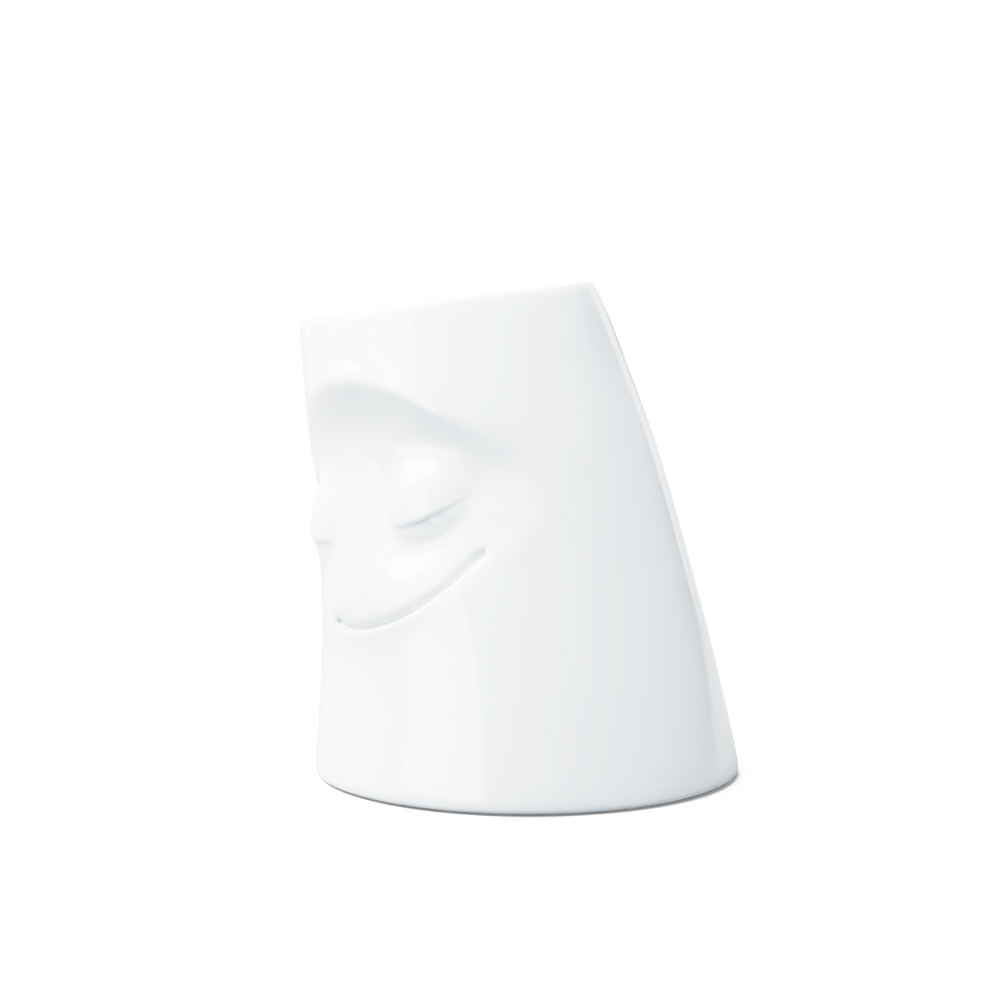 Exclusive designer candle holder with COZY facial expression. Stands at 3.3 inches tall on a footed base and fits a tea light or LED light. From the TASSEN product family of fun dishware by FIFTYEIGHT Products. Made in Germany according to environmental standards.