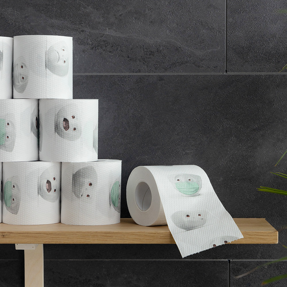 Roll of toilet paper with printed character design. Package diameter 4.3 inch, Height 4.1 inches, Weight 0.28 lbs. Single roll of soft toilet paper ships in a transparent gift box. Made in Germany according to environmental standards.