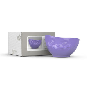 16 ounce capacity porcelain bowl in purple color featuring a sculpted ‘grinning’ facial expression. From the TASSEN product family of fun dishware by FIFTYEIGHT Products. Quality bowl perfect for serving cereal, soup, snacks and much more.
