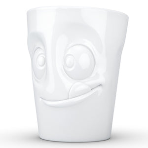 Coffee mug with 'tasty' facial expression and 11 oz capacity. From the TASSEN product family of fun dishware by FIFTYEIGHT Products. Tall coffee cup with handle in white, crafted from quality porcelain.