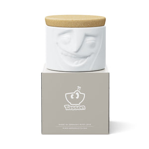 Quality porcelain storage jar with 30 oz. capacity and a 'cheerful' facial expression. Closes securely with a natural cork lid. Dishwasher and microwave-safe (except for cork lid).From the TASSEN product family of fun dishware by FIFTYEIGHT Products. Made in Germany according to environmental standards.standards.