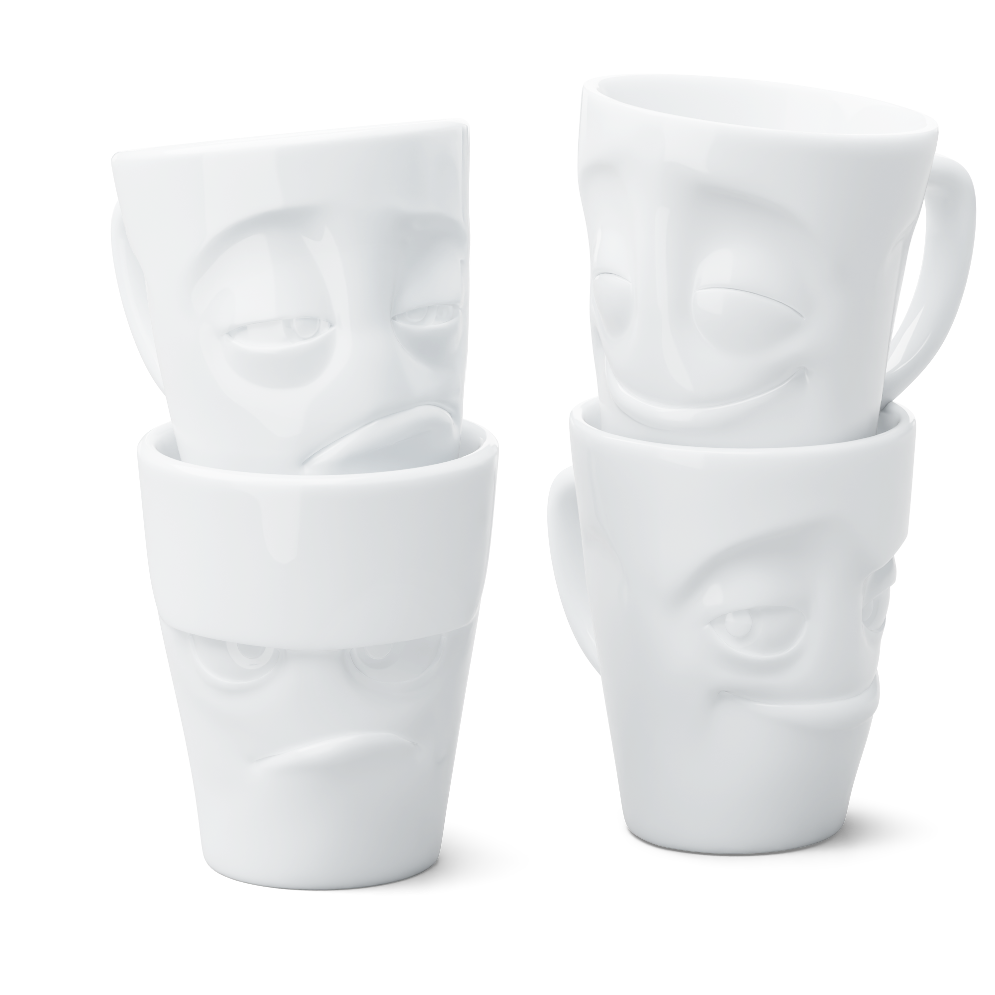 Set of four white porcelain mugs with face designs on a white background