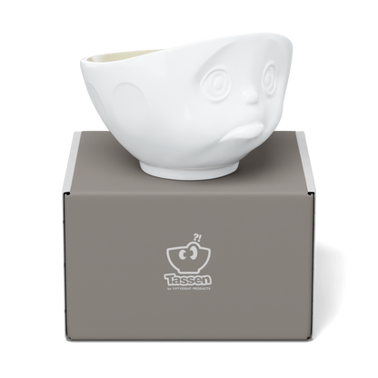Premium porcelain bowl in white with sand color on the inside from the porcelain product family by FIFTYEIGHT Products. Offers 16oz capacity perfect for serving cereal, soup, snacks and much more. Dishwasher and microwave safe bowl featuring a sculpted ‘sulking’ facial expression. Shipped in exclusively designed gift box.