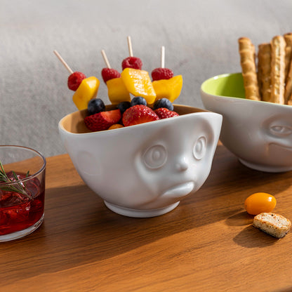 Premium porcelain bowl in white with sand color on the inside from the porcelain product family by FIFTYEIGHT Products. Offers 16oz capacity perfect for serving cereal, soup, snacks and much more. Dishwasher and microwave safe bowl featuring a sculpted ‘sulking’ facial expression. Shipped in exclusively designed gift box.