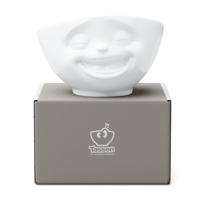 Premium porcelain bowl in white from the porcelain product family of fun dishware by FIFTYEIGHT Products. Offers 16 oz capacity perfect for serving cereal, soup, snacks and much more. Dishwasher and microwave safe bowl featuring a sculpted ‘laughing’ facial expression. Shipped in exclusively designed gift box.