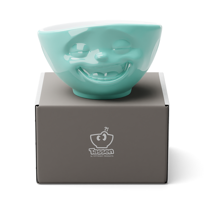 Premium porcelain bowl in mint color from the porcelain product family of fun dishware by FIFTYEIGHT Products. Offers 16 oz capacity perfect for serving cereal, soup, snacks and much more. Dishwasher and microwave safe bowl featuring a sculpted ‘laughing’ facial expression. Shipped in exclusively designed gift box.