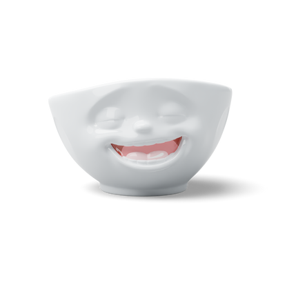 Premium porcelain bowl with colorful accents from TASSEN product family of fun dishware by FIFTYEIGHT Products. Offers 16 oz capacity perfect for serving cereal, soup, snacks and much more. Dishwasher and microwave safe bowl featuring a ‘Laughing’ facial expression and colorful details. Shipped in gift box.