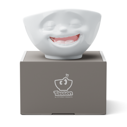 Premium porcelain bowl with colorful accents from TASSEN product family of fun dishware by FIFTYEIGHT Products. Offers 16 oz capacity perfect for serving cereal, soup, snacks and much more. Dishwasher and microwave safe bowl featuring a ‘Laughing’ facial expression and colorful details. Shipped in gift box.
