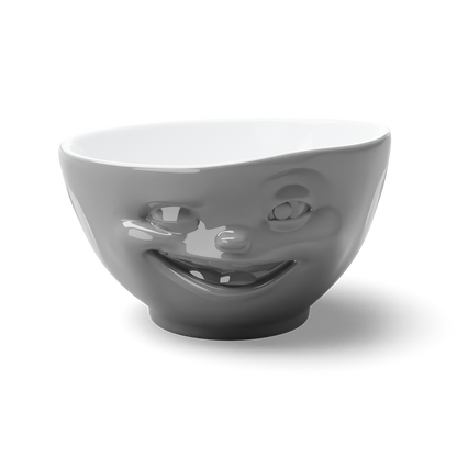 Premium porcelain bowl in grey color from the procelain product family of fun dishware by FIFTYEIGHT Products. Offers 16 oz capacity perfect for serving cereal, soup, snacks and much more. Dishwasher and microwave safe bowl featuring a sculpted ‘winking’ facial expression. Shipped in exclusively designed gift box.
