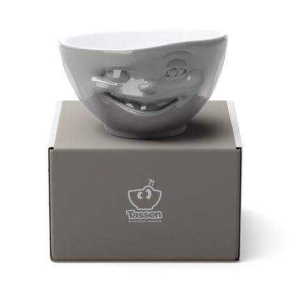 Premium porcelain bowl in grey color from the procelain product family of fun dishware by FIFTYEIGHT Products. Offers 16 oz capacity perfect for serving cereal, soup, snacks and much more. Dishwasher and microwave safe bowl featuring a sculpted ‘winking’ facial expression. Shipped in exclusively designed gift box.