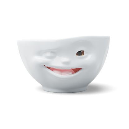 Premium porcelain bowl with colorful accents from TASSEN product family of fun dishware by FIFTYEIGHT Products. Offers 16 oz capacity perfect for serving cereal, soup, snacks and much more. Dishwasher and microwave safe bowl featuring a ‘Winking’ facial expression and colorful details. Shipped in gift box.