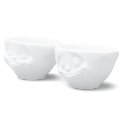 Set of two 3.3 oz. bowls in white from the porcelain product family of fun dishware by FIFTYEIGHT Products. Perfect for serving dips, sauces, nuts, sugar, spices, espresso, jam, honey, and more. Dishwasher and microwave safe bowls featuring 'happy' and 'Dreamy' faces. Shipped in exclusively designed gift box.
