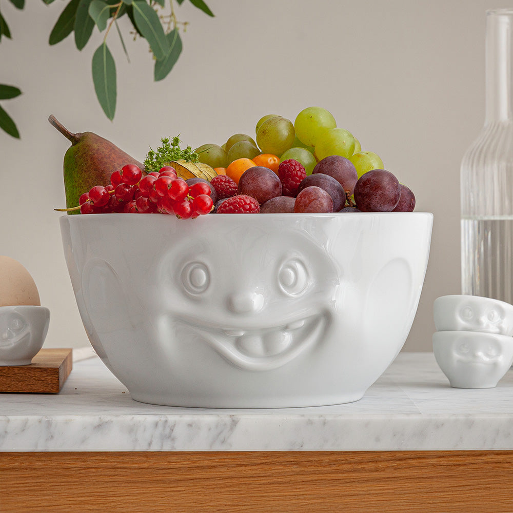 Extra big porcelain bowl in white from the porcelain product family of fun dishware by FIFTYEIGHT Products. Offers 87.5 oz capacity for serving salads, sides, stew, chili, chips, and more. Dishwasher and microwave safe bowl featuring a sculpted ‘out of control’ facial expression. Shipped in exclusively designed gift box.