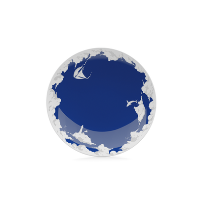 Porcelain dessert plate in featuring elaborate blue artwork with clouds and sailboats with 7.8 inch diameter. Premium porcelain in hotel quality, from the TASSEN product family of fun dishware by FIFTYEIGHT Products.