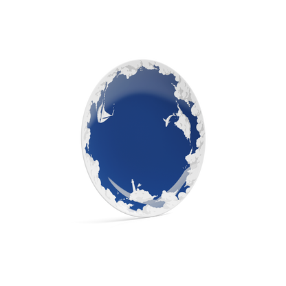 Porcelain dessert plate in featuring elaborate blue artwork with clouds and sailboats with 7.8 inch diameter. Premium porcelain in hotel quality, from the TASSEN product family of fun dishware by FIFTYEIGHT Products.