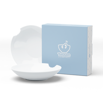 Set of two premium porcelain small deep plates in white with a 'bite mark' cutout at the edge. Dishwasher and microwave safes plate with a compact 7.1 inch diameter. From the porcelain product family of fun dishware by FIFTYEIGHT Products. Made in Germany according to environmental standards.