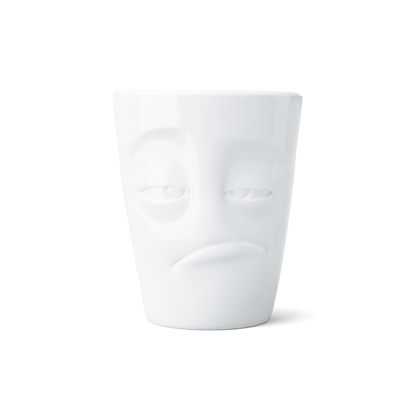 Premium porcelain coffee mug with handle from the popular product family of fun dishware by FIFTYEIGHT Products. Offers 11 oz capacity for serving coffee, tea, latte, matcha, soup and more. Dishwasher and microwave safe cup with a 'snoozy' facial expression. Shipped in exclusively designed gift box.