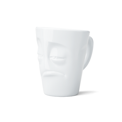 Premium porcelain coffee mug with handle from the popular product family of fun dishware by FIFTYEIGHT Products. Offers 11 oz capacity for serving coffee, tea, latte, matcha, soup and more. Dishwasher and microwave safe cup with a 'snoozy' facial expression. Shipped in exclusively designed gift box.