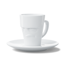 Load image into Gallery viewer, This amazing espresso mug with a &#39;grumpy&#39; facial expression and 2.7 oz capacity will start your day on a high note. Premium porcelain espresso cup in a tall &#39;mug&#39; design with saucer in white. From the TASSEN product family of fun dishware by FIFTYEIGHT Products.
