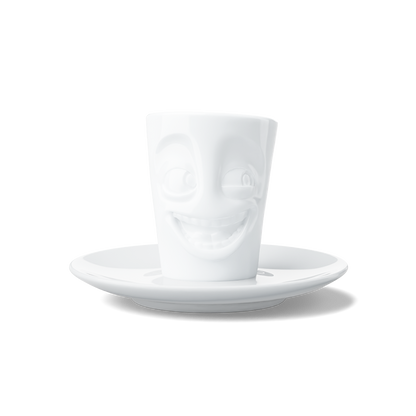 Premium porcelain espresso cup with saucer in white from the porcelain product family of fun dishware by FIFTYEIGHT Products. Offers 2.7 oz capacity and comes with a matching saucer. Dishwasher and microwave safe cup with a 'joking' facial expression. Shipped in exclusively designed gift box.