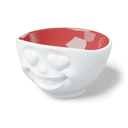 FIFTYEIGHT Products HEARTFUL Bowl with Ruby Interior, 500ml porcelain serving bowl featuring heart eyes emoji design. White exterior with rich ruby-red interior finish. Limited Special Edition, Made in Germany, dishwasher-safe.