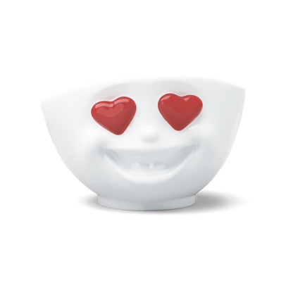 Premium porcelain bowl in white from the porcelain product family of fun dishware by FIFTYEIGHT Products. Featuring a sculpted ‘heartful’ facial expression inspired by heart eyes emoji with colorful eyes. Shipped in exclusively designed gift box.