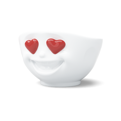 Premium porcelain bowl in white from the porcelain product family of fun dishware by FIFTYEIGHT Products. Featuring a sculpted ‘heartful’ facial expression inspired by heart eyes emoji with colorful eyes. Shipped in exclusively designed gift box.