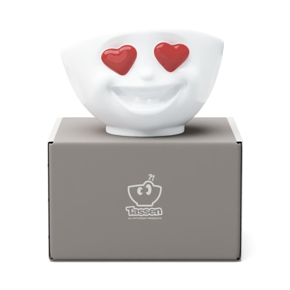 Premium porcelain bowl in white from the porcelain product family of fun dishware by FIFTYEIGHT Products. Featuring a sculpted ‘heartful’ facial expression inspired by heart eyes emoji with colorful eyes. Shipped in exclusively designed gift box.