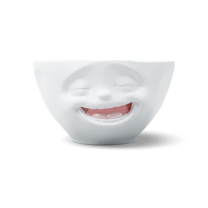 Premium porcelain bowl in white with colorful accents from the porcelain product family of fun dishware by FIFTYEIGHT Products. Offers 6.7 oz capacity perfect for serving ice cream to tapas, nuts and hearty dips. Dishwasher and microwave safe bowl featuring a sculpted ‘laughing’ facial expression. Shipped in exclusively designed gift box.