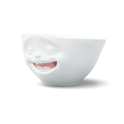 Premium porcelain bowl in white with colorful accents from the porcelain product family of fun dishware by FIFTYEIGHT Products. Offers 6.7 oz capacity perfect for serving ice cream to tapas, nuts and hearty dips. Dishwasher and microwave safe bowl featuring a sculpted ‘laughing’ facial expression. Shipped in exclusively designed gift box.