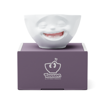 Premium porcelain bowl in white with colorful accents from the porcelain product family of fun dishware by FIFTYEIGHT Products. Offers 6.7 oz capacity perfect for serving ice cream to tapas, nuts and hearty dips. Dishwasher and microwave safe bowl featuring a sculpted ‘laughing’ facial expression. Shipped in exclusively designed gift box.