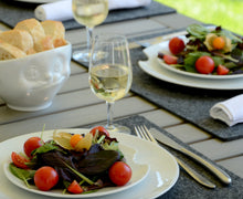 Load image into Gallery viewer, Set of two premium porcelain dinner plates in white with a &#39;bite mark&#39; cutout at the edge. Dishwasher and microwave safes plate with a 11 inch diameter. From the TASSEN product family of fun dishware by FIFTYEIGHT Products. Made in Germany according to environmental standards.
