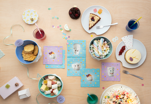 Pack of 20 disposable paper napkins in transparent packaging. Colorful paper napkins featuring zany TASSEN artwork in "Kid’s B-Day Party" design in lilac. 9.6 by 9.6 inches in size and Made in Germany according to environmental standards.