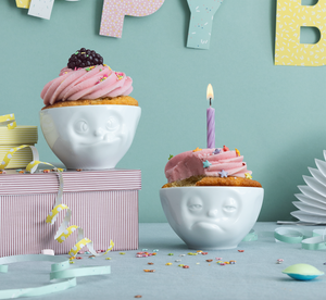 Set of two 6.5 oz. bowls in white featuring a sculpted ‘tasty’ and 'snoozy' faces. From the TASSEN product family of fun dishware by FIFTYEIGHT Products. Quality bowl perfect for serving snacks, nuts, chips, dips, sauces, and a few scoops of ice cream.