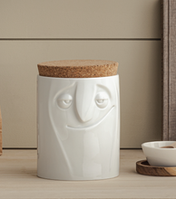 Load image into Gallery viewer, Quality porcelain storage jar with 57 oz. capacity and a &#39;charming&#39; facial expression. Closes securely with a natural cork lid. Dishwasher and microwave-safe (except for cork lid).From the TASSEN product family of fun dishware by FIFTYEIGHT Products. Made in Germany according to environmental standards.standards.
