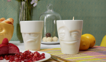 Load image into Gallery viewer, Set of two coffee mugs with &#39;Grumpy&#39; and &#39;Impish&#39; facial expression and 11 oz capacity. From the TASSEN product family of fun dishware by FIFTYEIGHT Products. Tall coffee cups without handles in white, crafted from quality porcelain.
