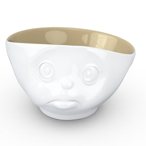 16 ounce capacity porcelain bowl in white with sand color on the inside featuring a sculpted ‘sulking’ facial expression. From the TASSEN product family of fun dishware by FIFTYEIGHT Products. Quality bowl perfect for serving cereal, soup, snacks and much more.
