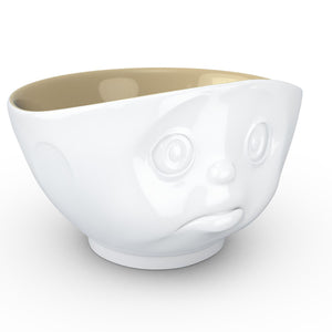 16 ounce capacity porcelain bowl in white with sand color on the inside featuring a sculpted ‘sulking’ facial expression. From the TASSEN product family of fun dishware by FIFTYEIGHT Products. Quality bowl perfect for serving cereal, soup, snacks and much more.