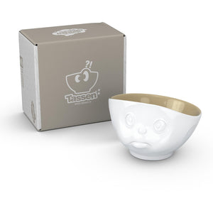 16 ounce capacity porcelain bowl in white with sand color on the inside featuring a sculpted ‘sulking’ facial expression. From the TASSEN product family of fun dishware by FIFTYEIGHT Products. Quality bowl perfect for serving cereal, soup, snacks and much more.