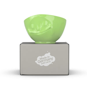 16 ounce capacity porcelain bowl in light green color featuring a sculpted ‘happy’ facial expression. From the TASSEN product family of fun dishware by FIFTYEIGHT Products. Quality bowl perfect for serving cereal, soup, snacks and much more.